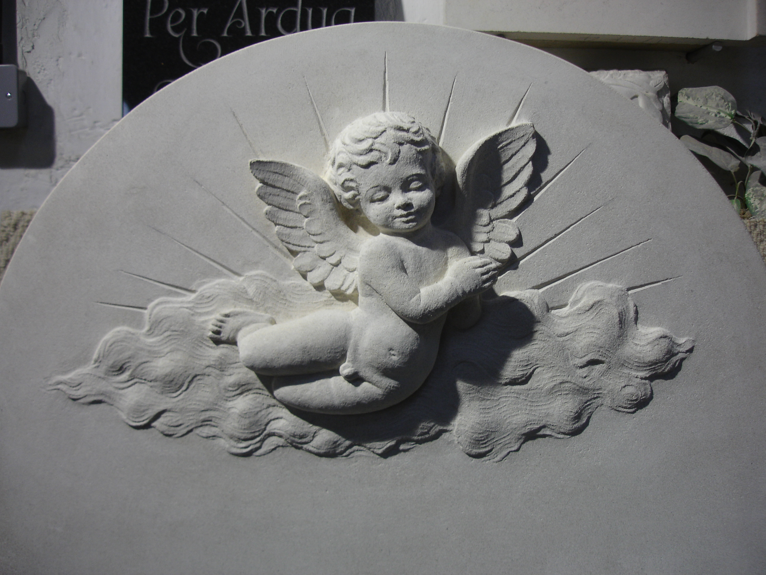 Relief carved Cherub