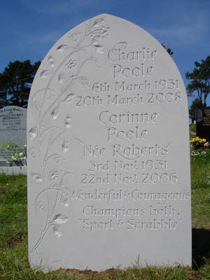 Flowers carved in face of headstone