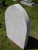 Headstone with lettering on curved edge